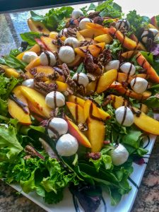 Platter of stone fruit salad with balsamic